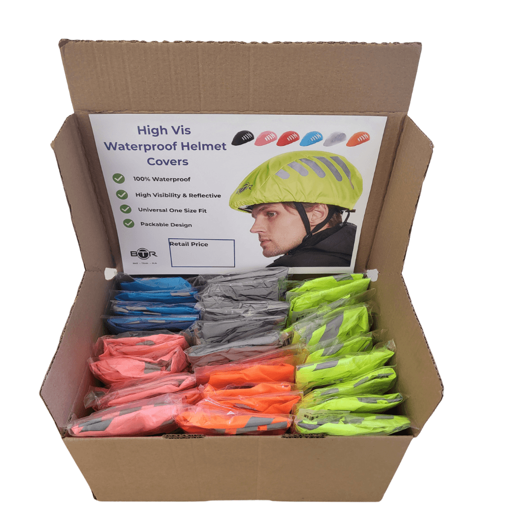 BTR helmet cover counter display unit — open with colourful covers arranged and product info card